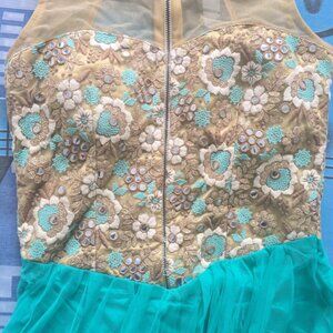 Single piece gown with bottoms + chunni  Back is deep , front has combination ha